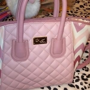 Iam selling a Betsey Johnson purse